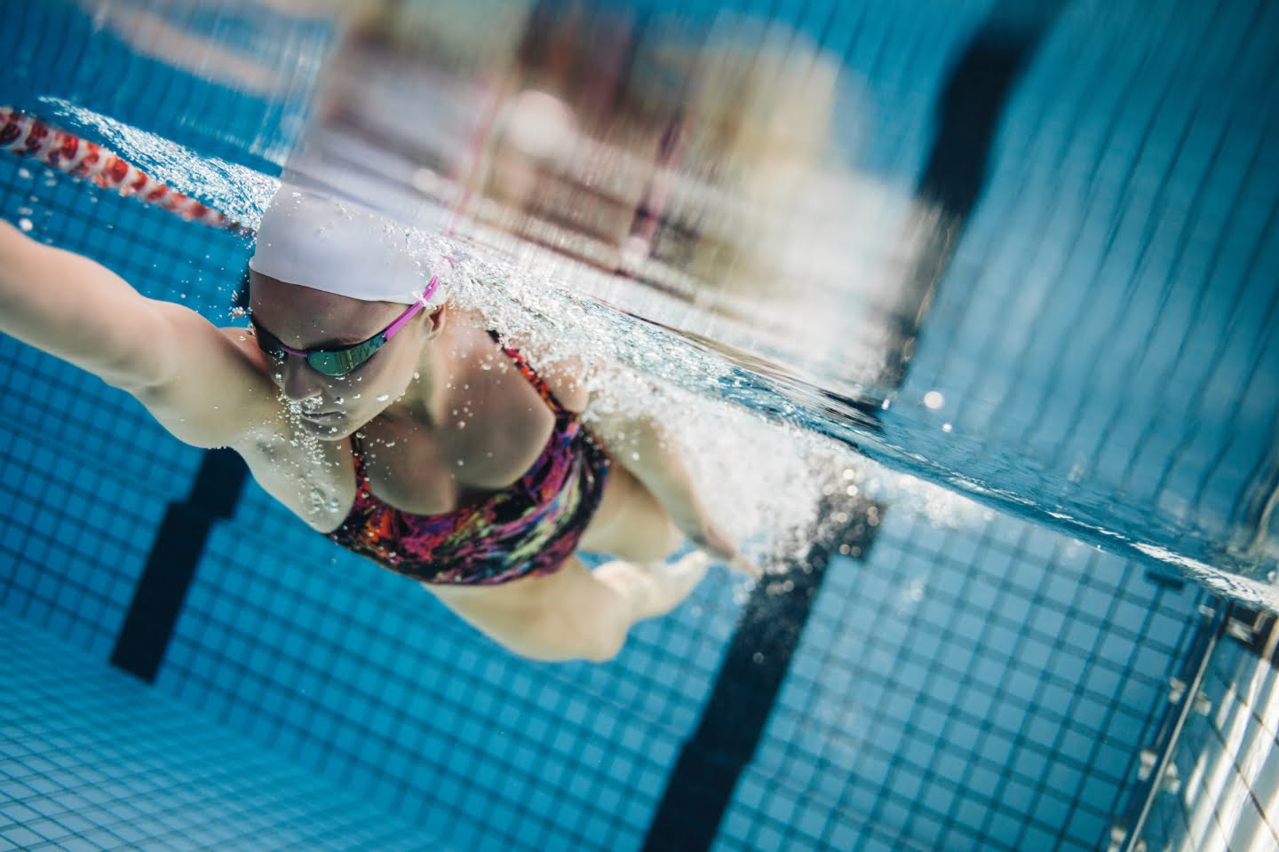 Woman Swimmnig in swimming pool armagh swimming club along lane